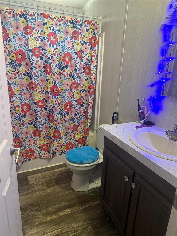 6505 Oil Well Road Clermont, FL 34714 - Photo 16 of 30 a bathroom with a sink toilet and shower
