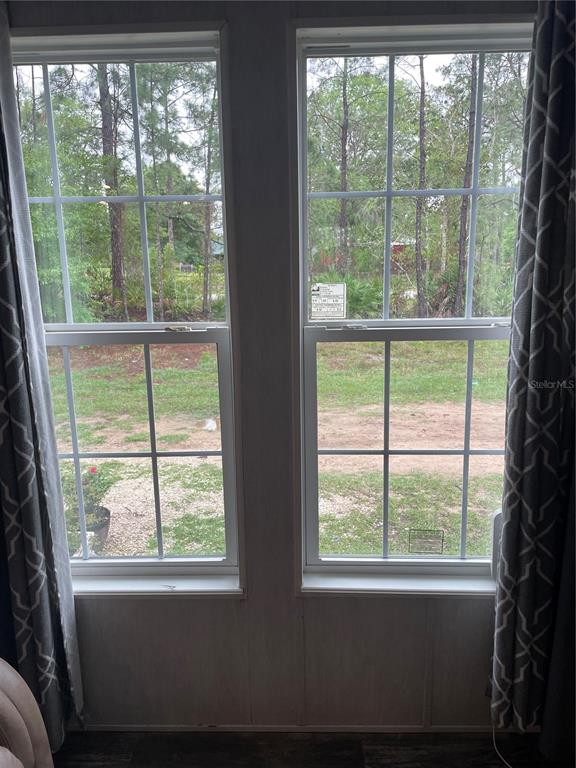 6505 Oil Well Road Clermont, FL 34714 - Photo 7 of 30 a view of a room that has a window in it