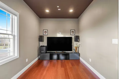 a view of a living room with a flat screen tv