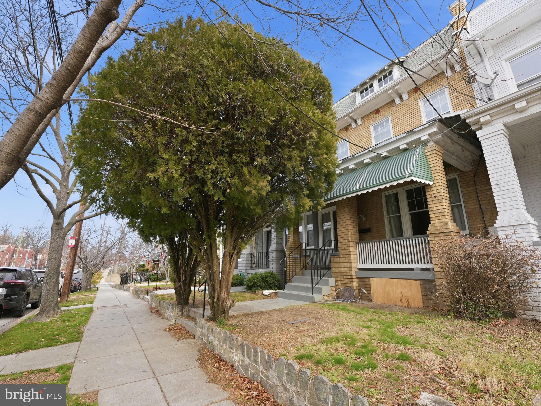 a house with trees in front of it