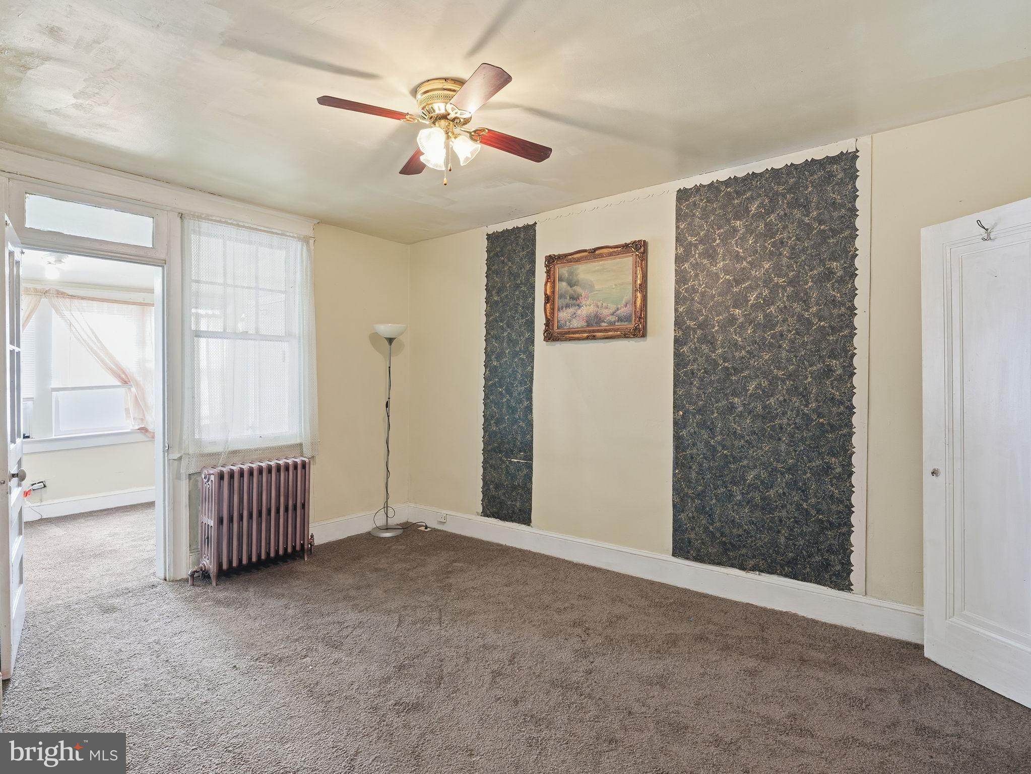 5733 9th Street Northwest Washington, DC 20011 - Photo 9 of 20 a view of an empty room with a window