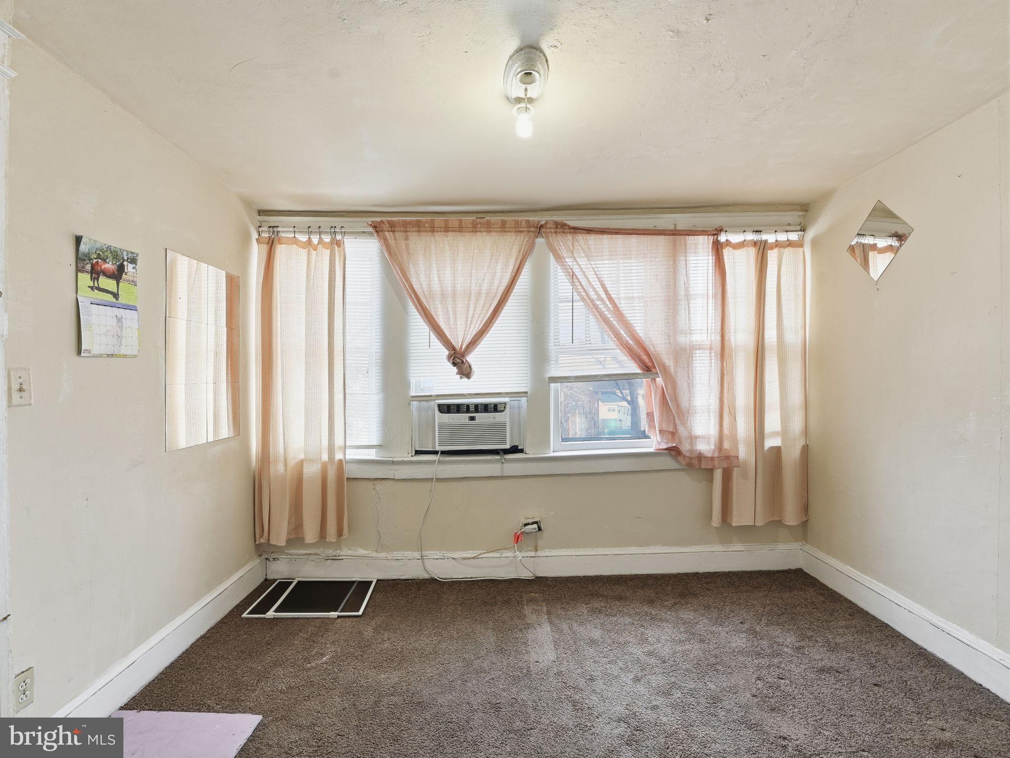 5733 9th Street Northwest Washington, DC 20011 - Photo 10 of 20 an empty room with a window