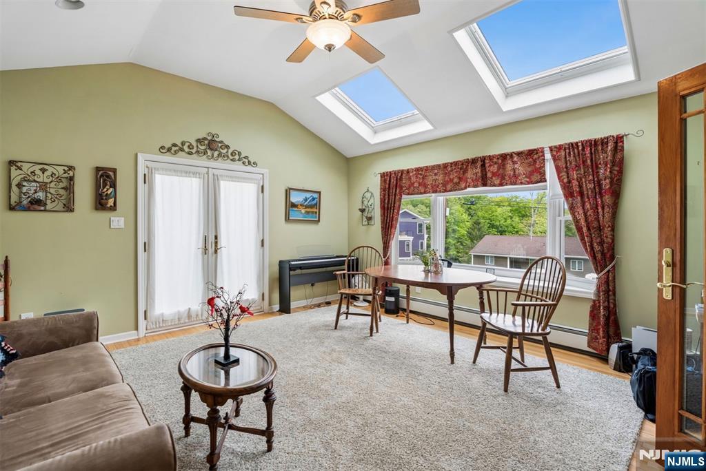 6 Waters Edge Butler, NJ 07405 - Photo 10 of 28 a living room with furniture and a large window