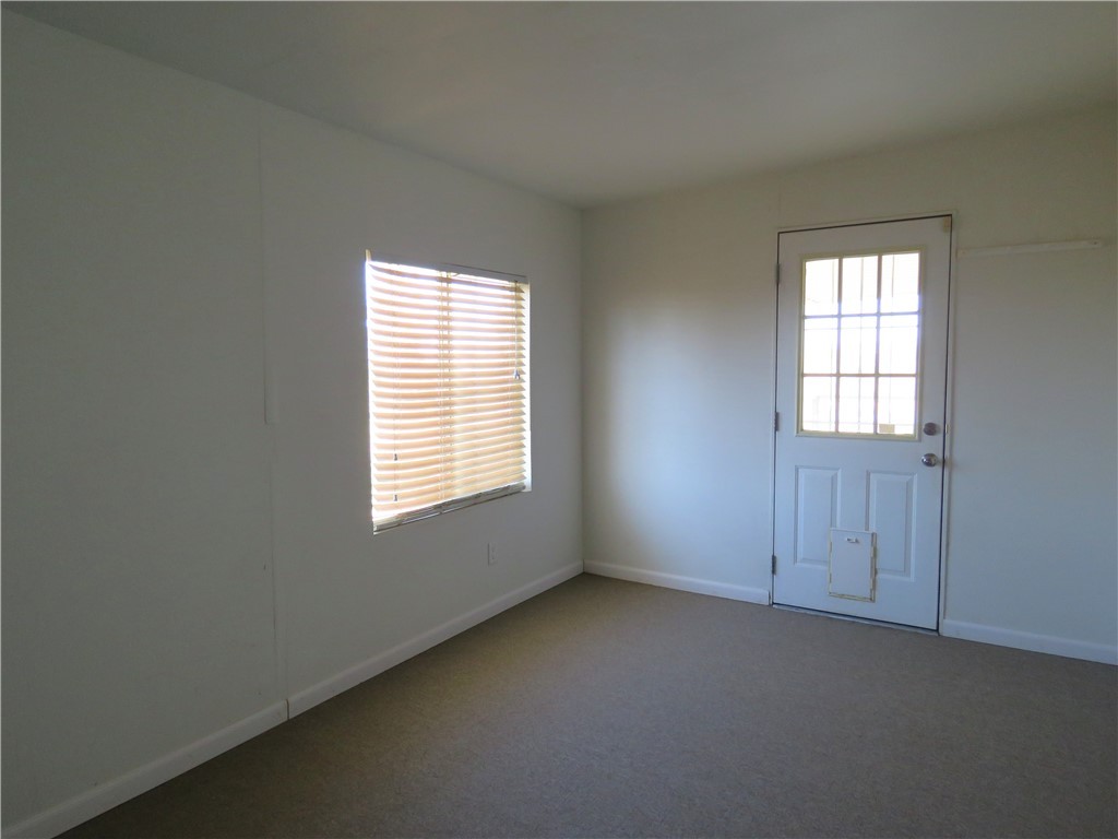 785 Bacobi Road Golden Valley, AZ 86413 - Photo 18 of 35 an empty room with a window