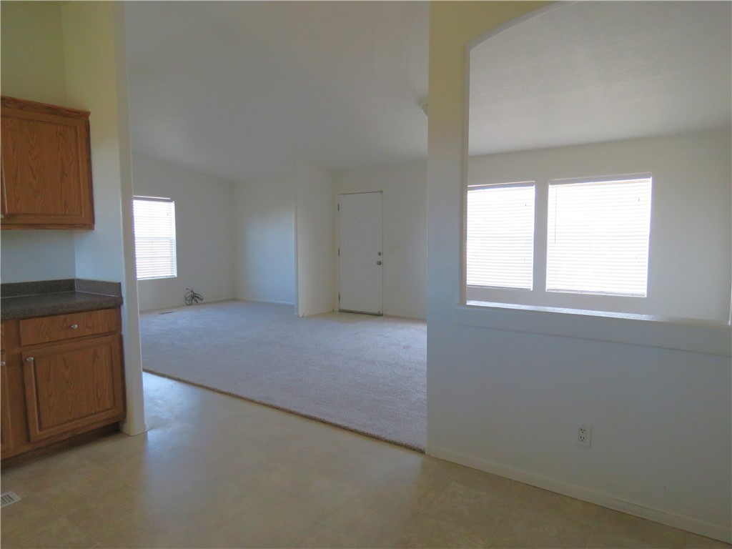 785 Bacobi Road Golden Valley, AZ 86413 - Photo 24 of 35 a view of an empty room and window