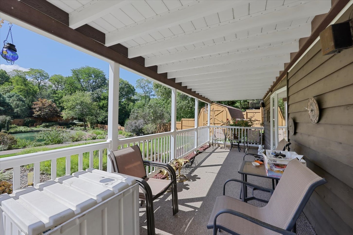 12 Circle Drive Decatur, IL 62521 - Photo 25 of 35 a view of a patio with a table chairs and a potted plant