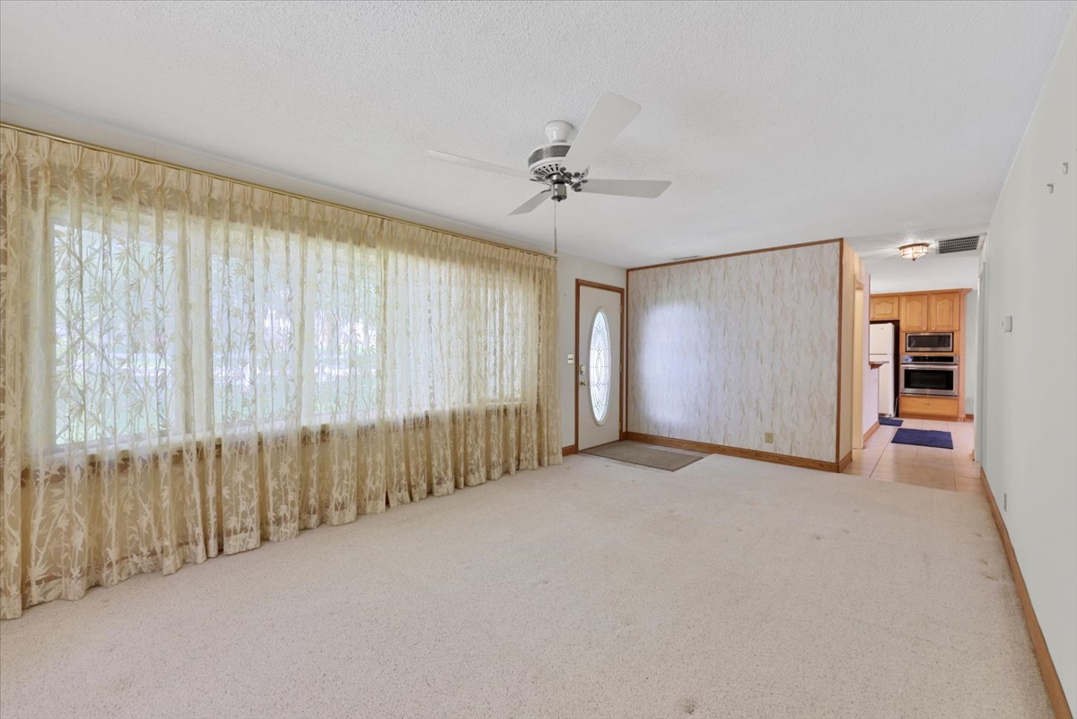 12 Circle Drive Decatur, IL 62521 - Photo 5 of 35 a view of an empty room with a window