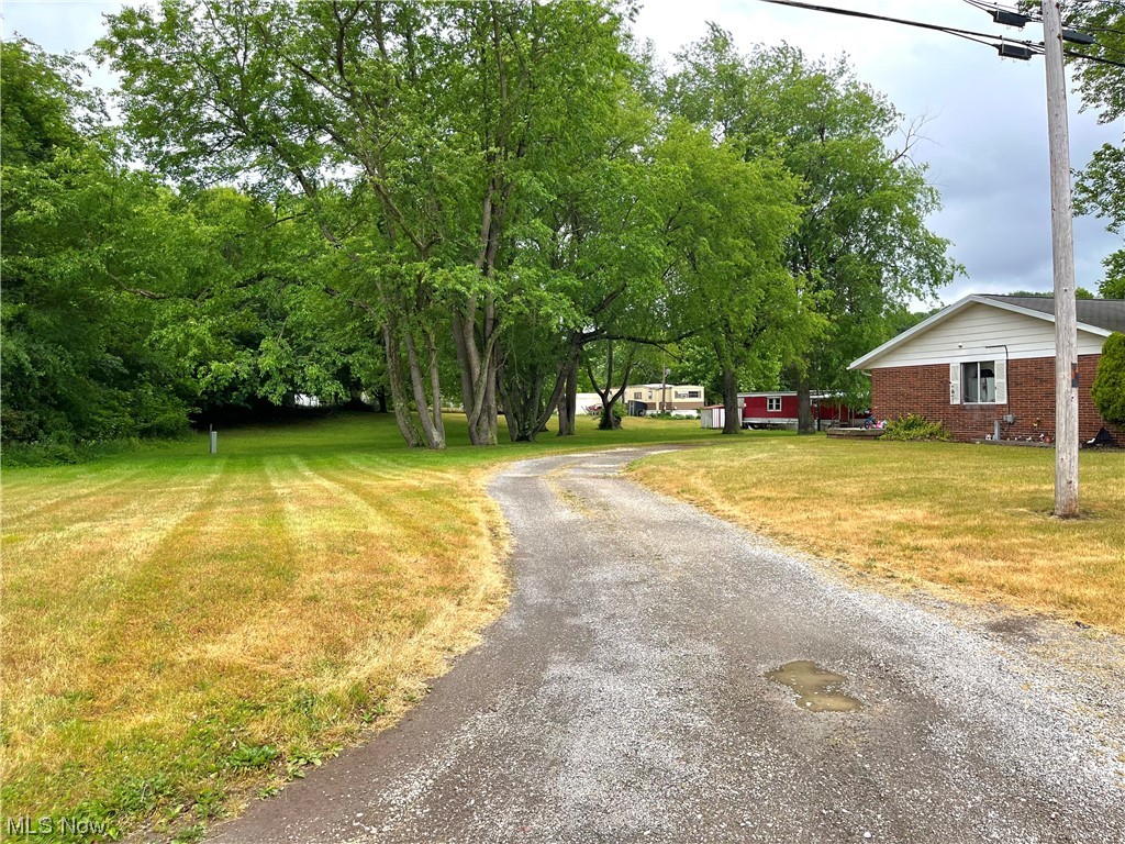 1180 Kennel Road Northwest Minerva, OH 44657 - Photo 14 of 17 Looking towards the back of the lots with the triplex driveway.