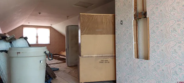 a view of storage and utility room