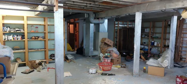 a bathroom with a bathtub and shower