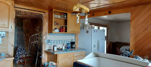 a view of living room with furniture and a window