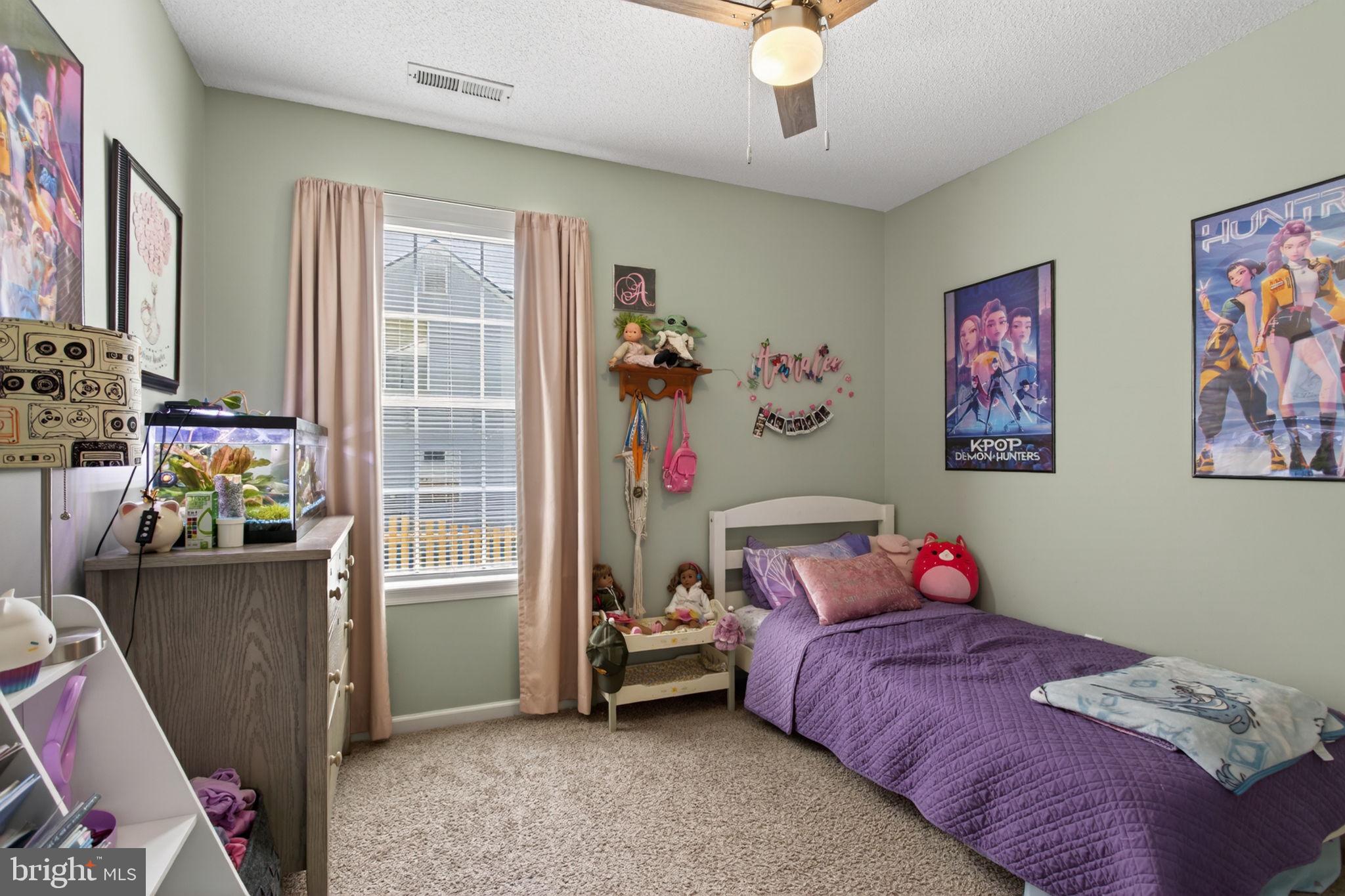 3917 Longhill Station Road Williamsburg, VA 23188 - Photo 14 of 29 Charming kids' room with playful decor.
