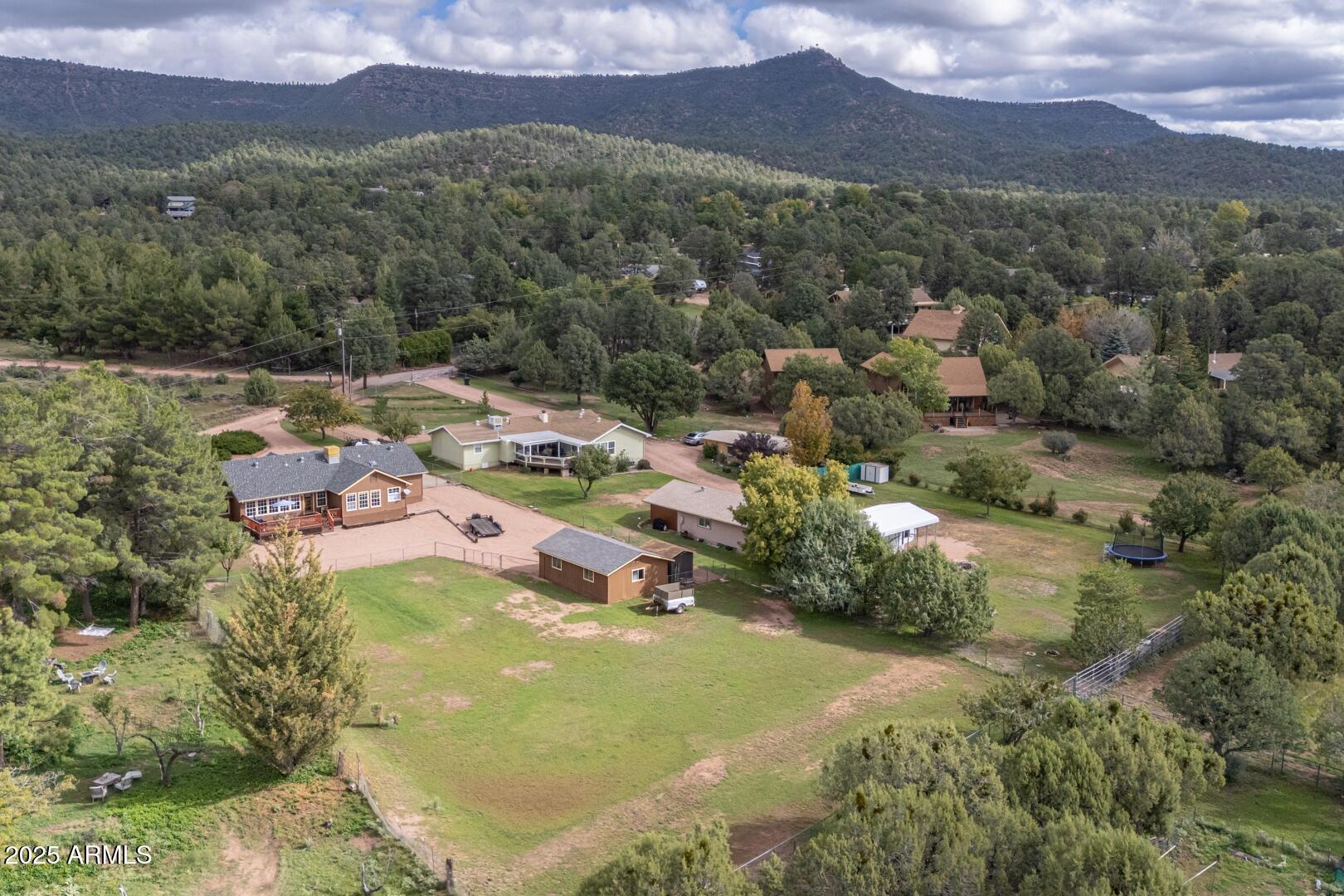 155 Claxton Road Payson, AZ 85541 - Photo 45 of 46 an aerial view of residential houses with outdoor space and a lake view