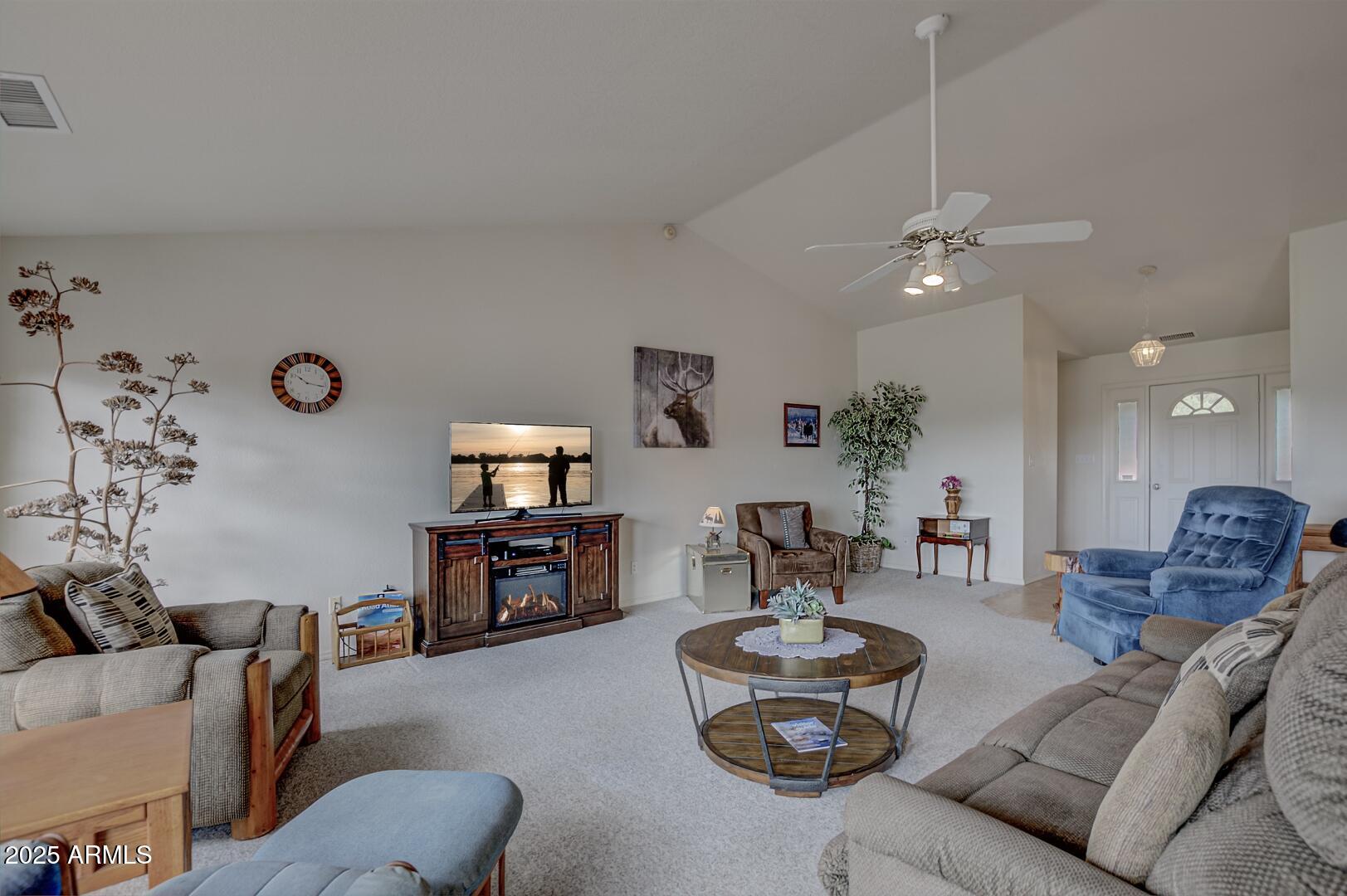 155 Claxton Road Payson, AZ 85541 - Photo 6 of 46 a living room with furniture and a flat screen tv