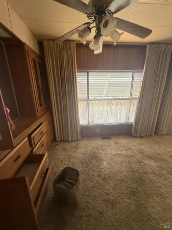 a view of a livingroom with a furniture