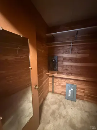 a front view of a house with a fountain