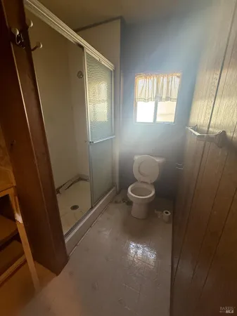 en empty room with windows