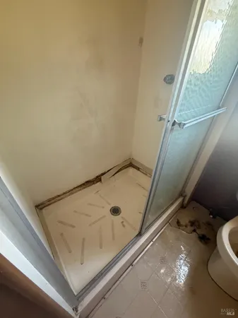 a view of an empty room and window