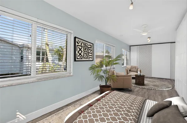 a living room with furniture and a window
