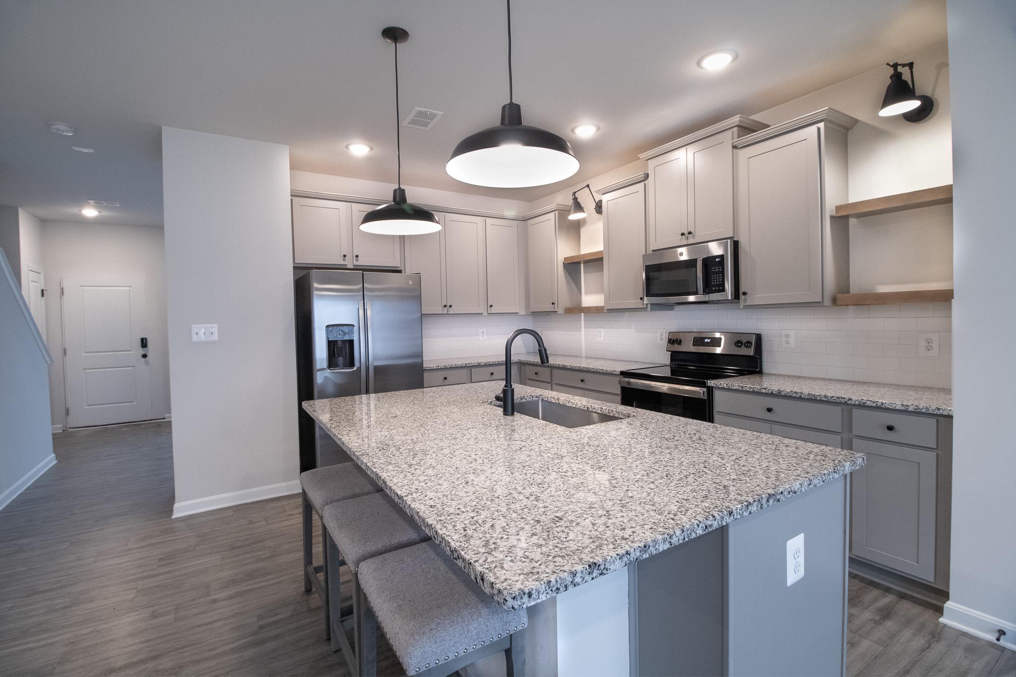 154 Diving Scaup Road Hedgesville, WV 25427 - Photo 25 of 63 Modern kitchen with sleek finishes.