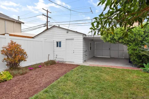 a house view with a backyard space