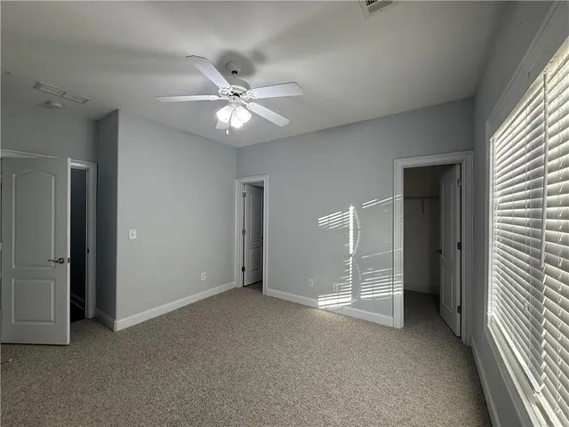 a view of an empty room and a gallery