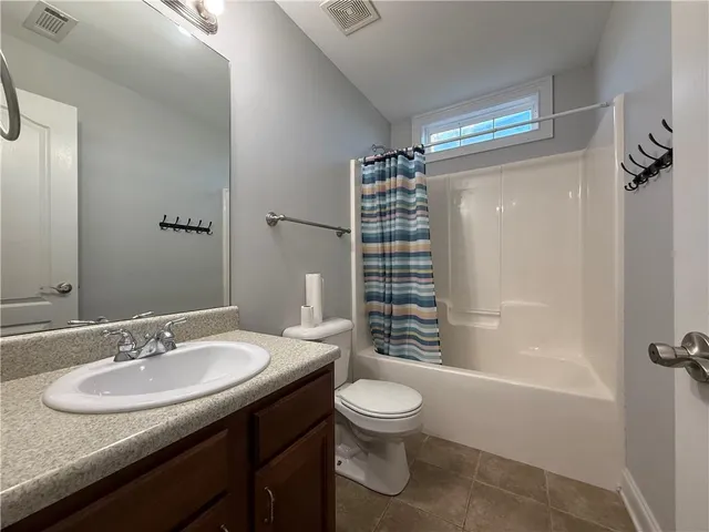 a view of livingroom and dining room with furniture