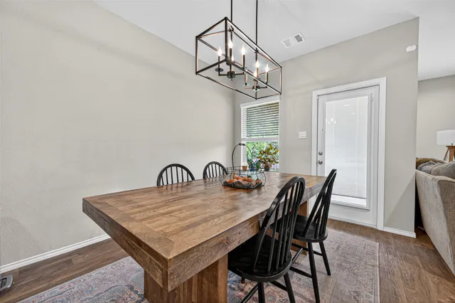 a en suite bathroom with a sink double vanity and a mirror