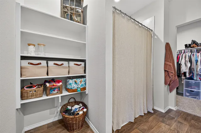 a large white house with a large pool and a yard