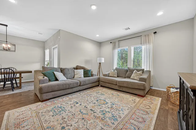 a kitchen with stainless steel appliances granite countertop a sink and stove