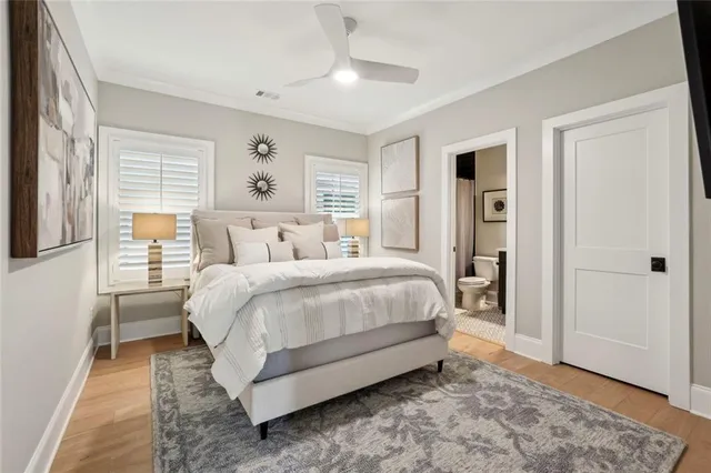 a bed room with a bed and a window