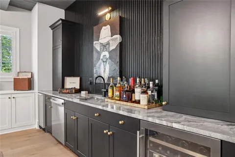 a bathroom with a sink vanity and a mirror