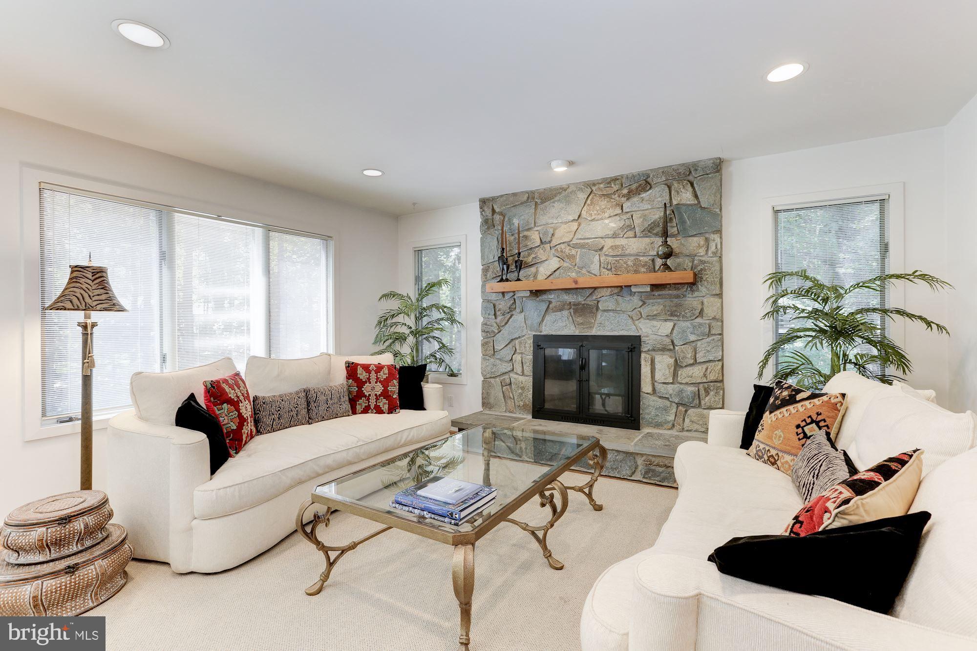 11593 Lake Newport Road Reston, VA 20194 - Photo 28 of 82 Great room with stone fireplace