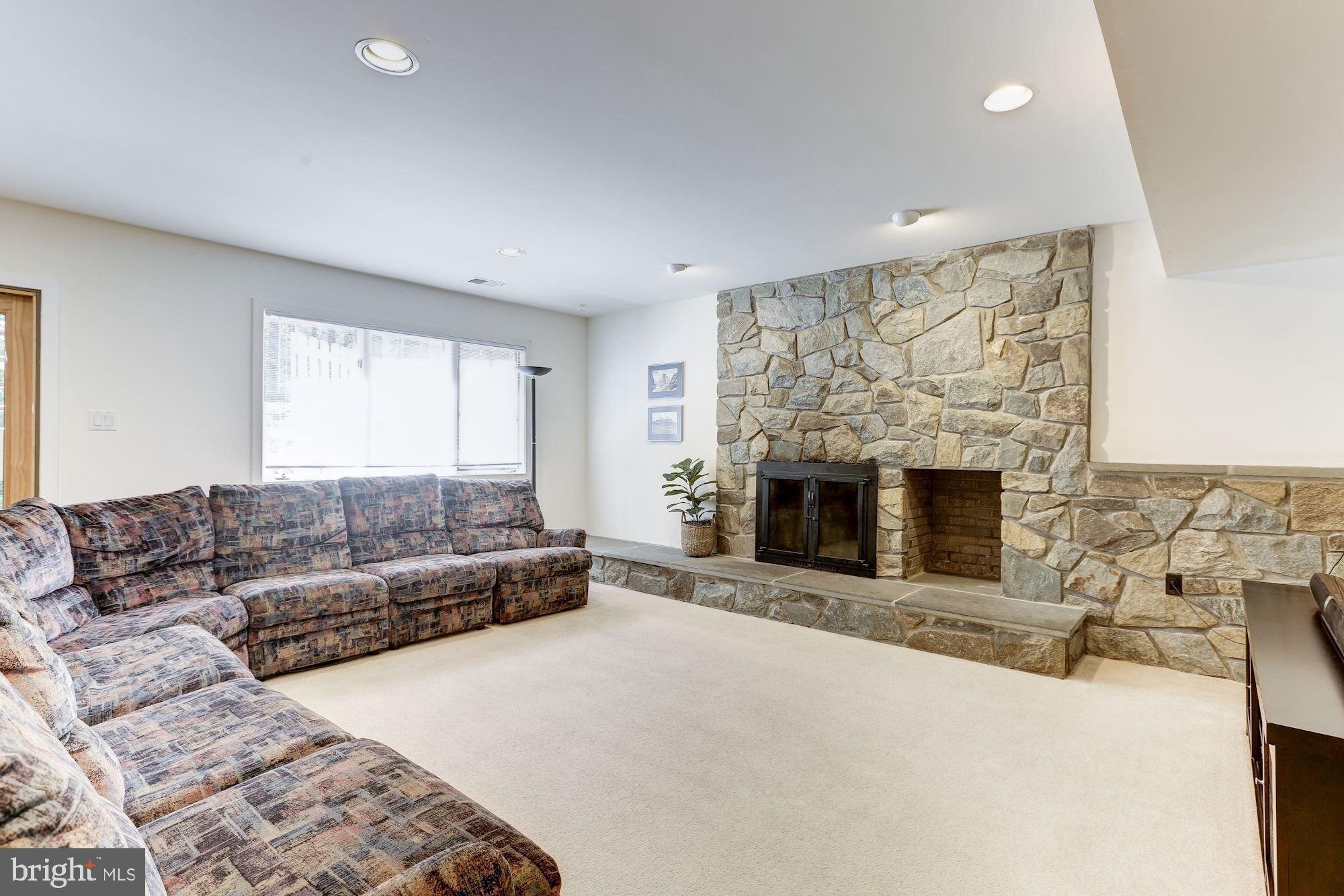 11593 Lake Newport Road Reston, VA 20194 - Photo 67 of 82 Lower level fam. rm with stone fpl