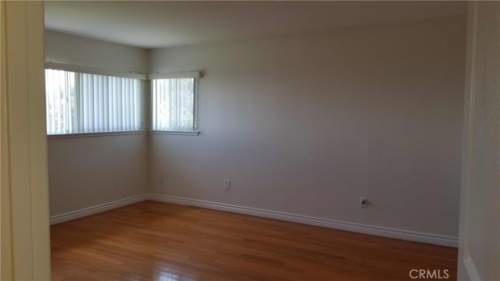 28012 Seashell Way Rancho Palos Verdes, CA 90275 - Photo 16 of 20 wooden floor in an empty room with a window