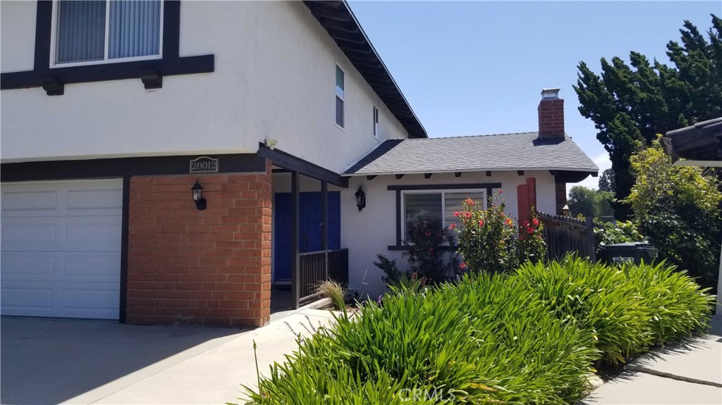 28012 Seashell Way Rancho Palos Verdes, CA 90275 - Photo 2 of 20 a front view of a house with garden