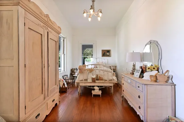 a aerial view of a house with a yard