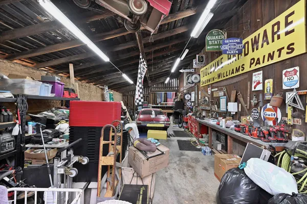 a view of a house with backyard and porch