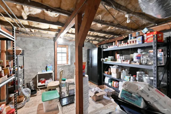 an aerial view of house with yard