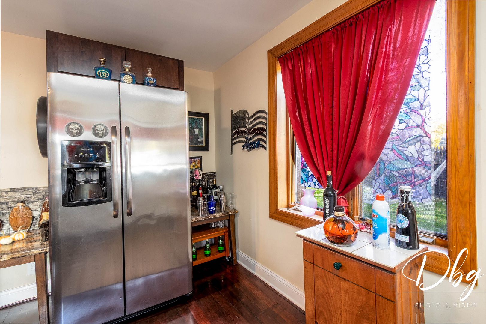 20862 West Genoa Avenue Lake Villa, IL 60046 - Photo 8 of 32 a kitchen with stainless steel appliances granite countertop a refrigerator and a table with wooden floor