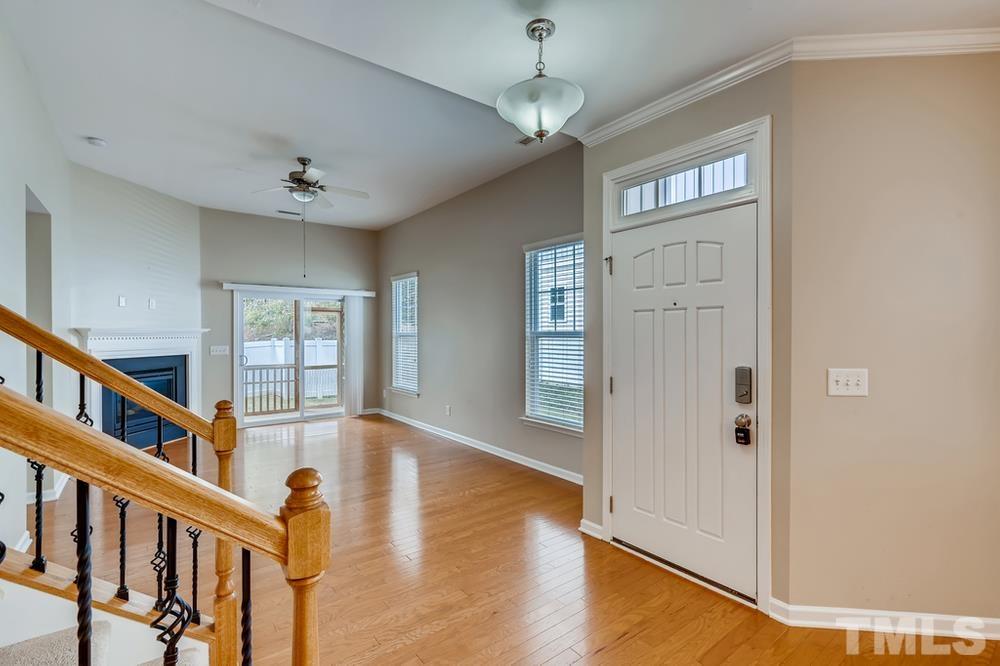 1258 Silver Beach Way Raleigh, NC 27606 - Photo 4 of 28 wooden floor in an empty room with a window