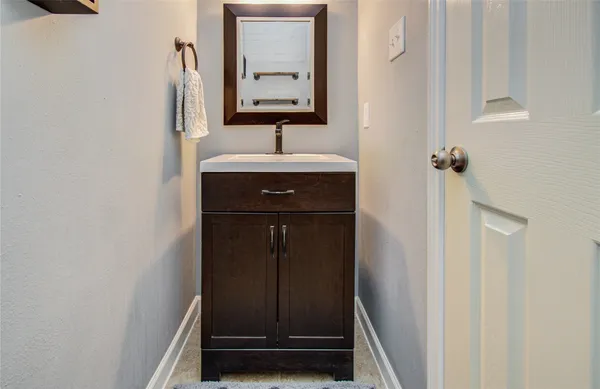 a view of empty room with ceiling fan
