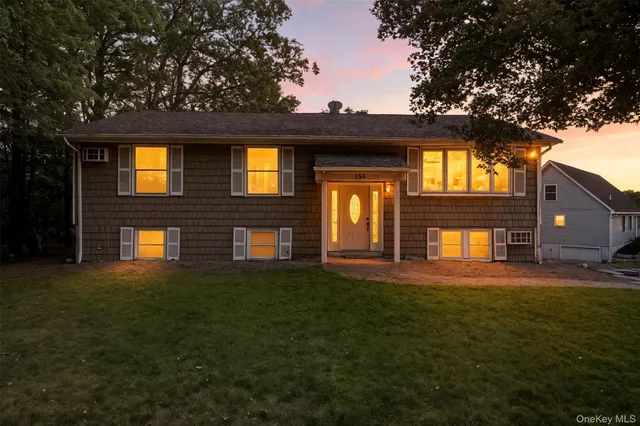 a house view with a garden space