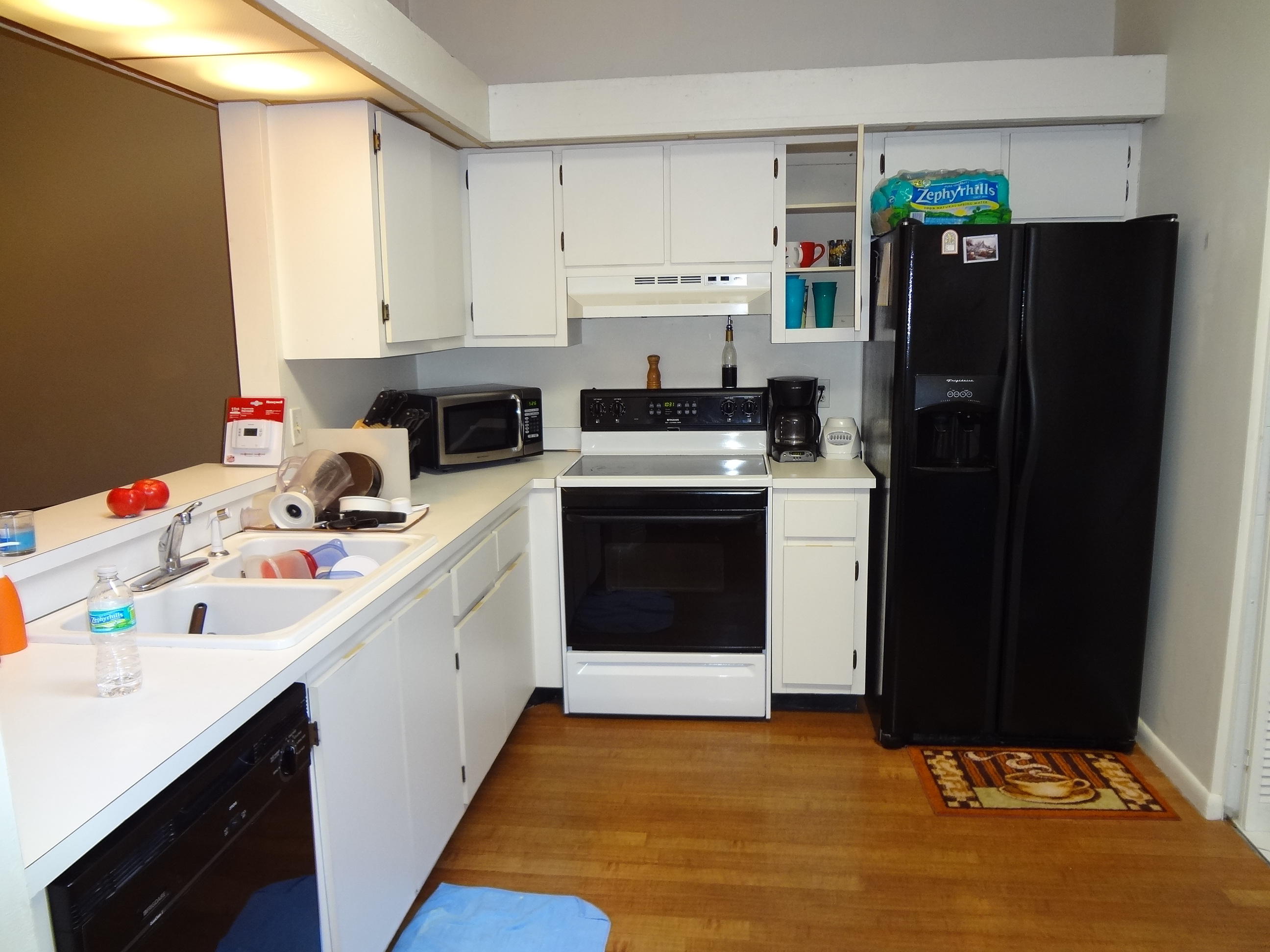 22477 Vistawood Way Boca Raton, FL 33428 - Photo 4 of 12 a kitchen with a sink stove and refrigerator