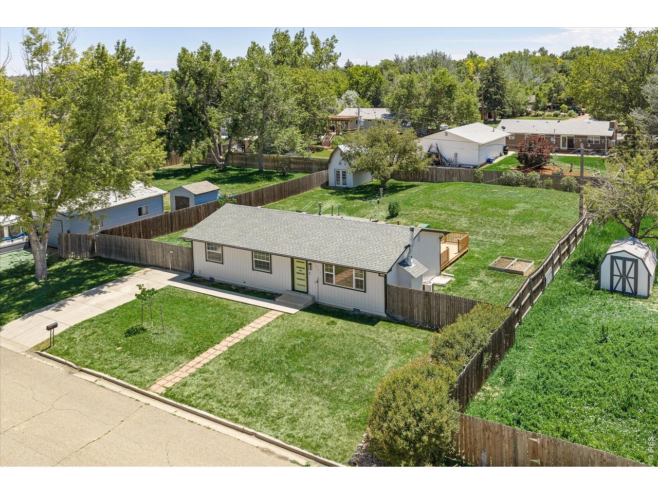 9234 Arapahoe Road Boulder, CO 80303 - Photo 6 of 43 fully fenced .33 acre lot, offering privacy and room to garden, play or entertain