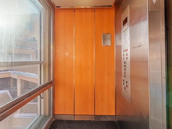 a view of a large building with a street