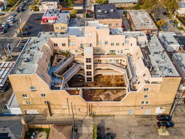 a view of dinning table and chairs in a room