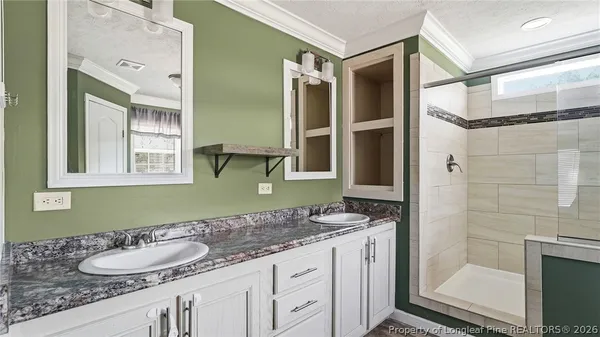 a bathroom with a shower and a bathtub