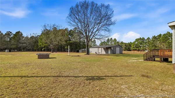 a house view with swimming pool in outdoor space