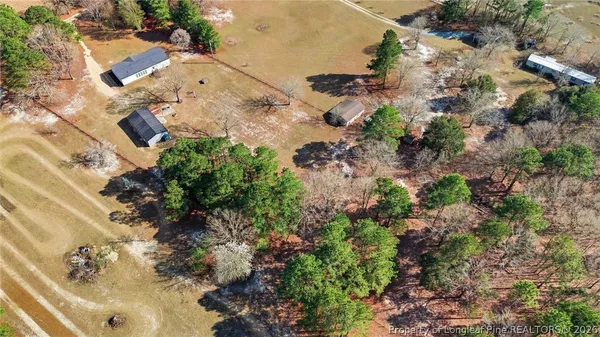 an aerial view of residential house with outdoor space
